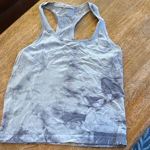 Swiftly waist length racer back.